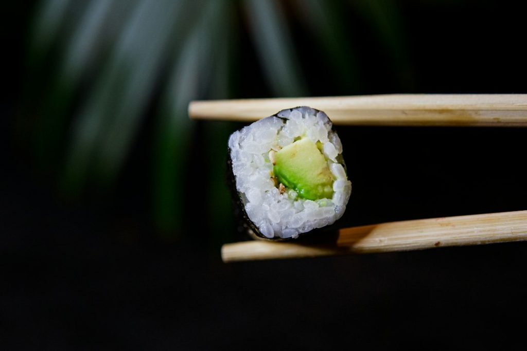 Fresh sushi rolls with salmon and avocado