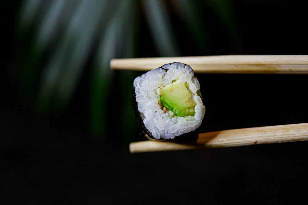 Fresh sushi rolls with salmon and avocado